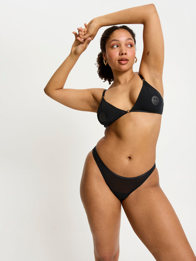 SPSCMHBLAW_Smileyworld_x_Modibodi_Sparkle_Cheeky_Brief_Moderate-Heavy_Black_LivS14_14000.jpg
